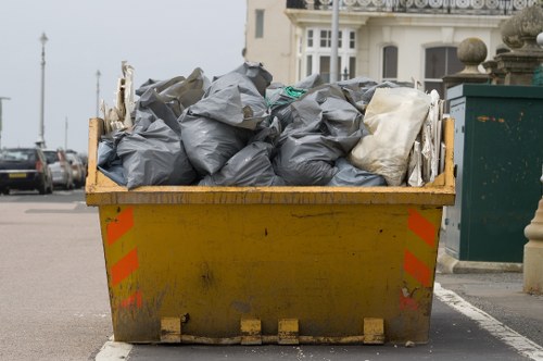 Truck and skip outside a Croydon terrace property